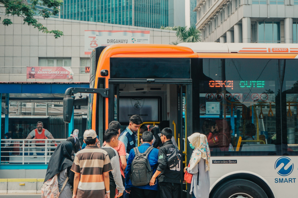 Urban bus at station with live tracking concept